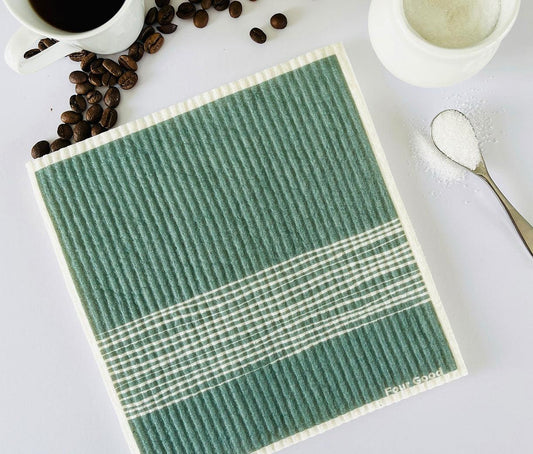 Four Good Green Sponge Cloth on Kitchen Bench