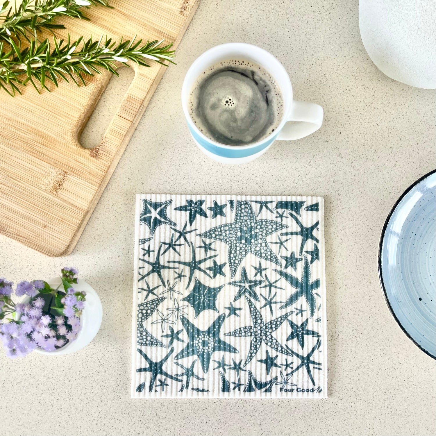 Kitchen bench with eco friendly swedish dishcloth for sustainable cleaning