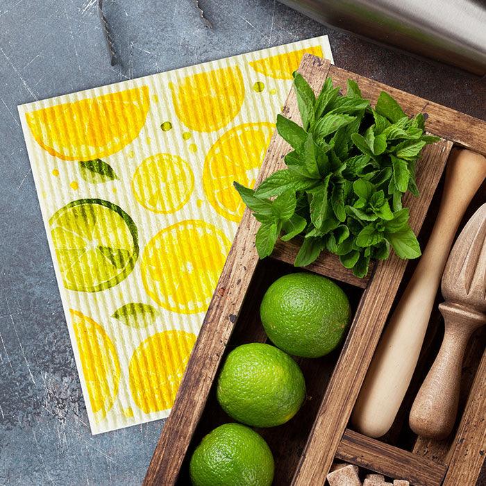 Eco friendly sponge cloth with lemon design on kitchen bench