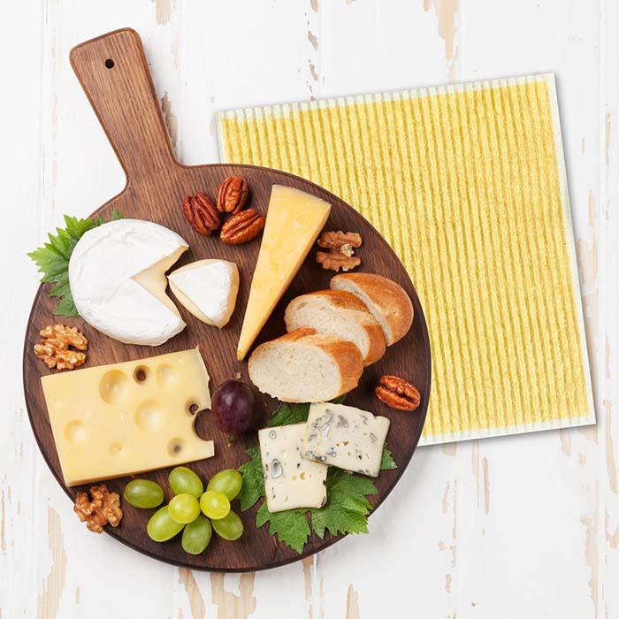 Cheese board with zero waste solid lemon sponge cloth